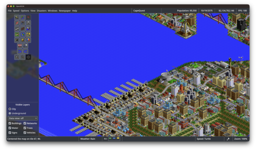 Waterfront city with bridges and a seaport